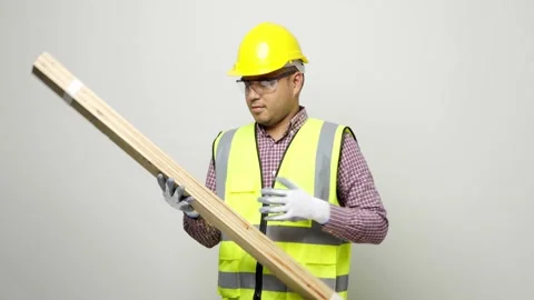Young asian craftsman checking quality of wood and showing thumbs up. Carpenter  Stock Footage 144259967