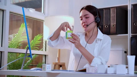 Young asian creative woman development packaging cosmetic and skincare prod.. Stock Footage 331269653