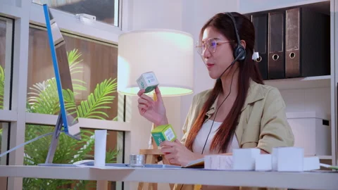 Young asian creative woman development packaging cosmetic and skincare prod.. Stock Footage 331269828