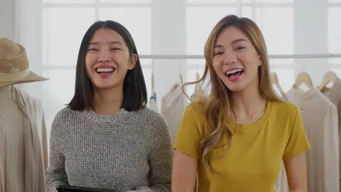 Young asian designer using video camera to present her fashion design. Stock Footage 199823273