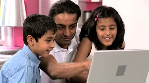 Young Asian Father &amp; Children Using Laptop in Kitchen Stock Footage 8854005
