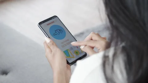 Young asian female checking parcel delivers order on smartphone application. Stock Footage 138454818