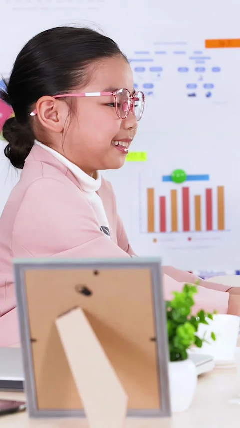 Young Asian Girl in Pink Blazer Acting as Professional Businesswoman in Office Stock Footage 331348053