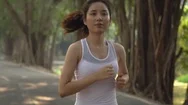 Young Asian Girl Running In A Park During Summer Day Stock Footage