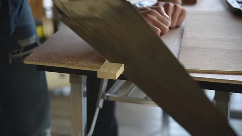 Young Asian group man worker cutting wood plank for build diy wood furniture Stock Footage