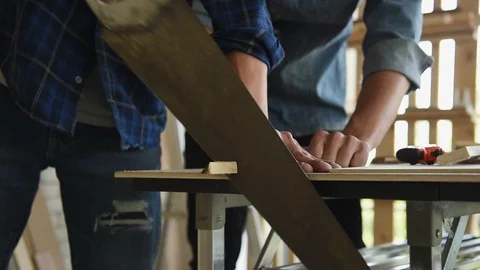 Young Asian group man worker discuss and planning about diy wood furniture Stock Footage 124105087