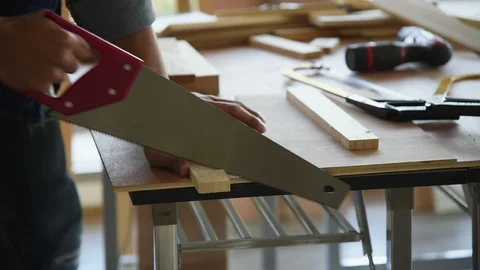 Young Asian group man worker cutting wood plank for build diy wood furniture Stock Footage 124105880