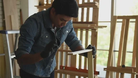 Young Asian group man worker discuss and planning about diy wood furniture Stock Footage 124884634