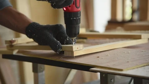 Young Asian group man worker using electric hand drill Stock Footage 124896895