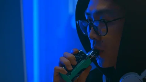 Young Asian Guy In Glasses And Hood Vapi Stock Video Pond5