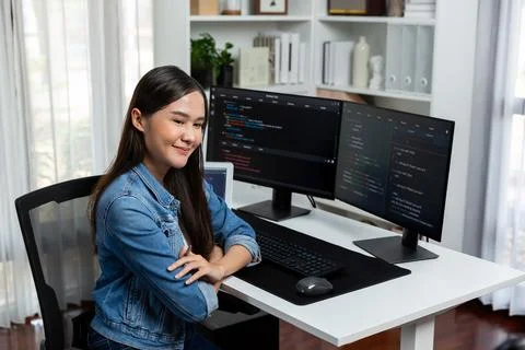 Young Asian in IT developer looking out surround application data. Stratagem. 스톡 사진