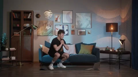 Young asian man doing training push-up in front of laptop at home, home gym Stock Footage 156402046