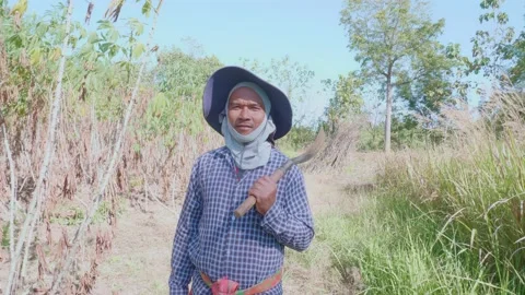 Young Asian man, farmer, fully dressed. Stock Footage 167937788