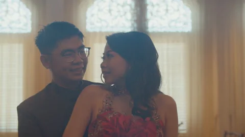Young Asian Man Hugging His Girlfriend in His Engagement Day Stock Footage 161465845