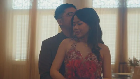 Young Asian Man Hugging His Girlfriend in His Engagement Day Stock Footage 161477005
