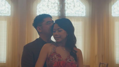 Young Asian Man Hugging His Girlfriend in His Engagement Day Stock Footage 161477592