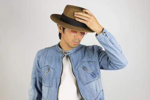 Young Asian Man in Jeans or Denim Jacket Wear Red Glasses and Hat Stock Photos