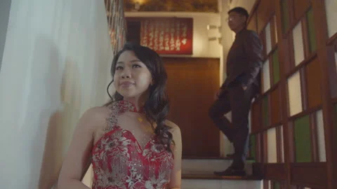 Young Asian Man Looking At His Girlfriend In The Stair Stock Footage 161550158