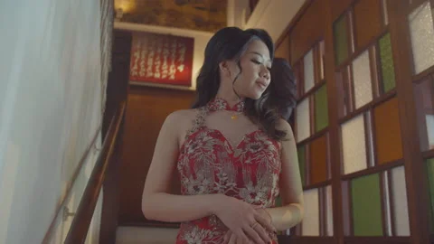 Young Asian Man Looking At His Girlfriend In The Stair Stock Footage 161564086