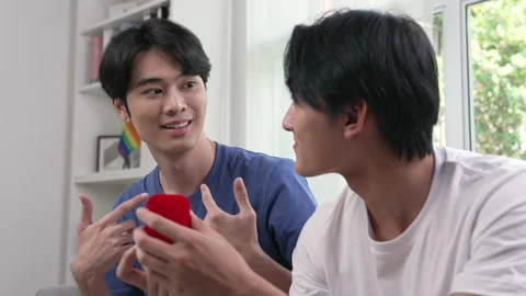 Young Asian man proposing to his boyfriend. Stock Footage 217455012