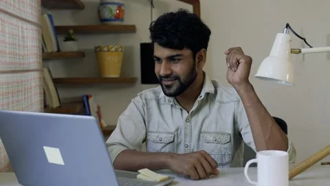 Young Asian man smiling,using laptop for internet and social media. Video stock 155576848