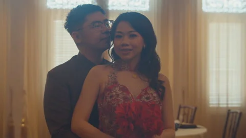 Young Asian Man Walking Toward Her Girlfriend in His Engagement Day Stock Footage 161472831