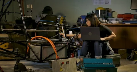 Young Asian Mechanical Engineers Working in Studio Workshop. Stock Footage 115287359
