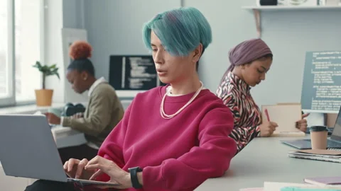 Young Asian Programmer Working on Laptop Stock Footage 241265179