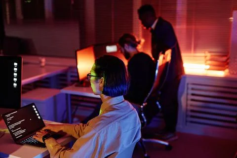 Young Asian software developer working over new program Stock Photos