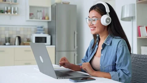 Young asian student studying online watching education webinar on laptop Stock Footage 218476959