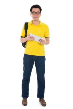 Young asian student using pad pc isolated on white background. Stock Photos