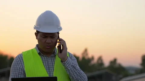Young Asian Technician Engineer man hold laptop computer  Stockbeeldmateriaal 198123355