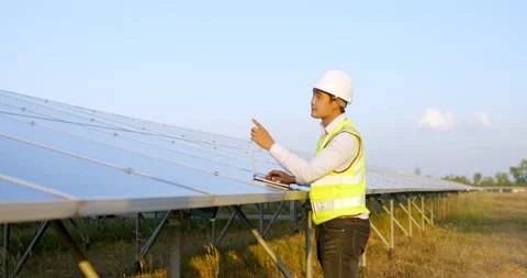 Young Asian technician man checking operation of sun and photovoltaic solar  스톡 동영상 197920731