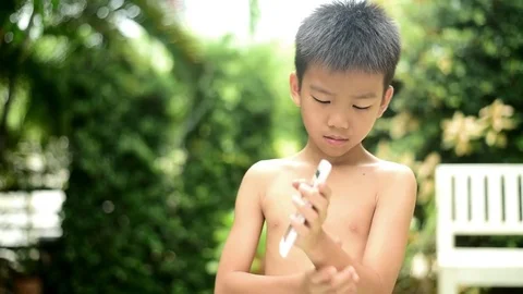 Young Asian Thai boy feel pain at his muscle at hand  Stock Footage 79021604