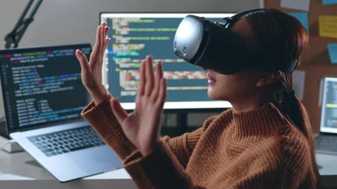 Young Asian woman, developer programmer, software engineer using VR Stock Footage 196912411