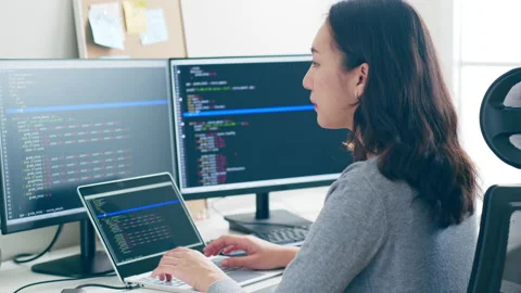 Young Asian woman, developer programmer, software engineer, working Stock Footage 221106192