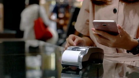 Young Asian Woman Using Mobile Phone Smart Payment Stock Footage 117401665