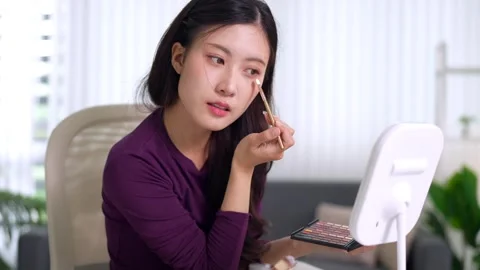 Young Asian women using tablet computer stylus pen digital drawing creative.. Stock Footage 334327754