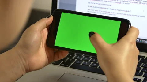 Young Assistant Searching Her Mail On Her Smart Phone In Landscape Mode Video stock 65150547