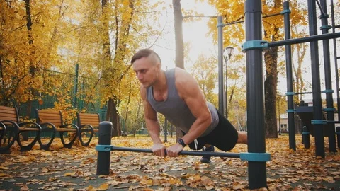 Young athlete does push-up exercise with narrow chest grip Stock Footage 96771771