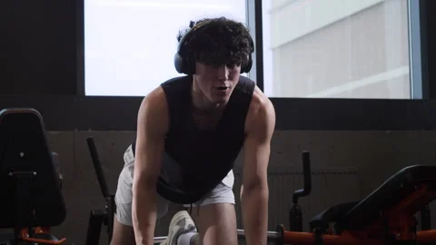 Young Athlete Doing Exercise in Gym Stock Footage 332302312