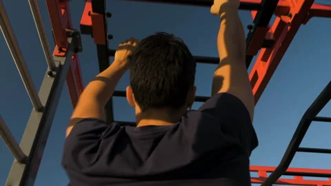 Young athlete doing exercises on the bar and stairs Stock Footage 122851679