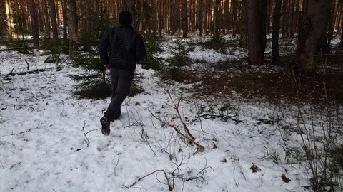The Young athlete doing physical exercises in the forest. 스톡 동영상 105614691