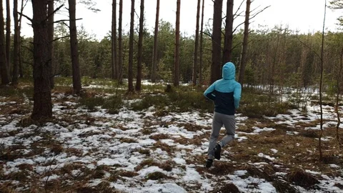 The Young athlete doing physical exercises in the forest. Stock Footage 105615328