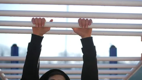 Young athlete doing warm up exercises before training Stock Footage 125810862