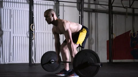 Young athlete getting ready and starting deadlift exercise at the gym Stock Footage 65280191