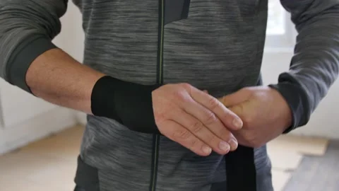 Young athlete getting ready for fight. Boxer wrapping hands with boxing tapes Stock Footage 146457271