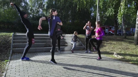 Young Athlete Group Do Warm Up Fitness Festival Stock Footage 107564499