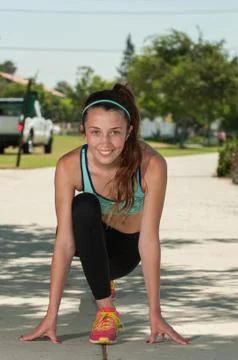 Young athlete lunging forward Stock Photos