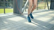 Young Athlete Man In Comfortable Sport Outfit Jumping Rope On A Sports Field On Stock Footage